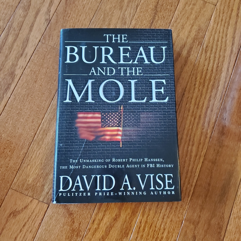 The bureau and the mole. David vise. Hard back book.
